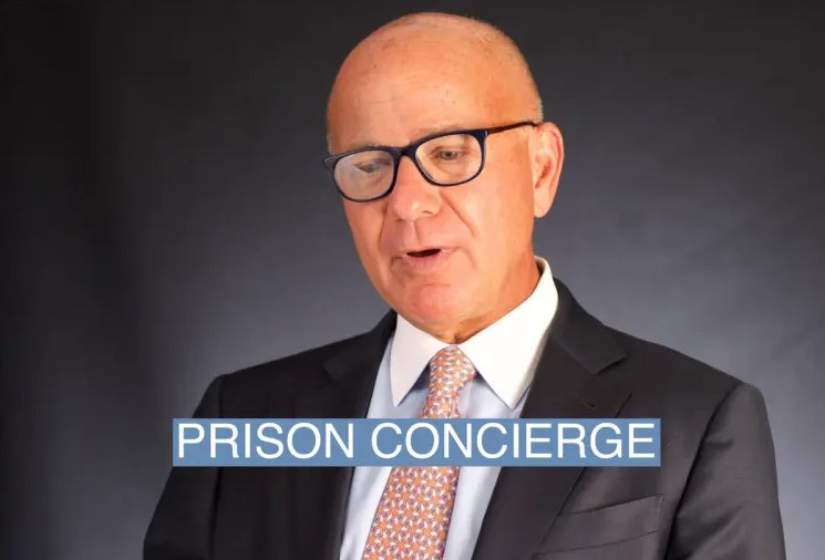 sam mangel federal prison concierge photo